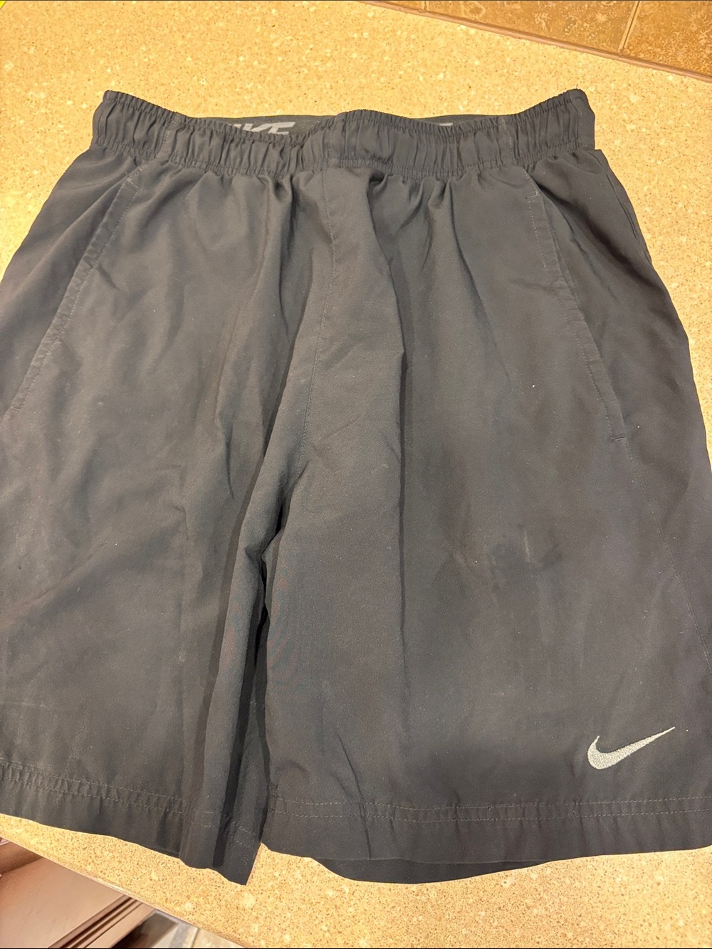 Nike Black Athletic Shorts with Silver Swoosh